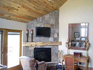 Living Area with Large Stone Fireplace