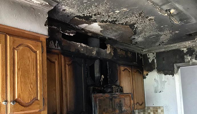 wall cabinet kitchen fire smoke damage restoration